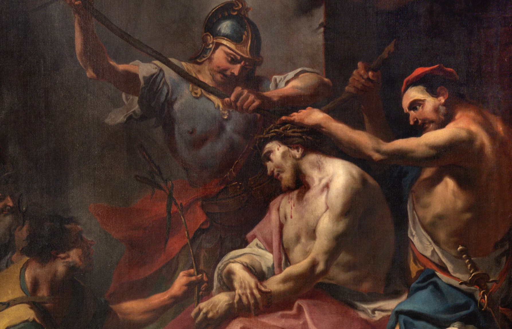 Jesus suffers meekly while being crowned with thorns