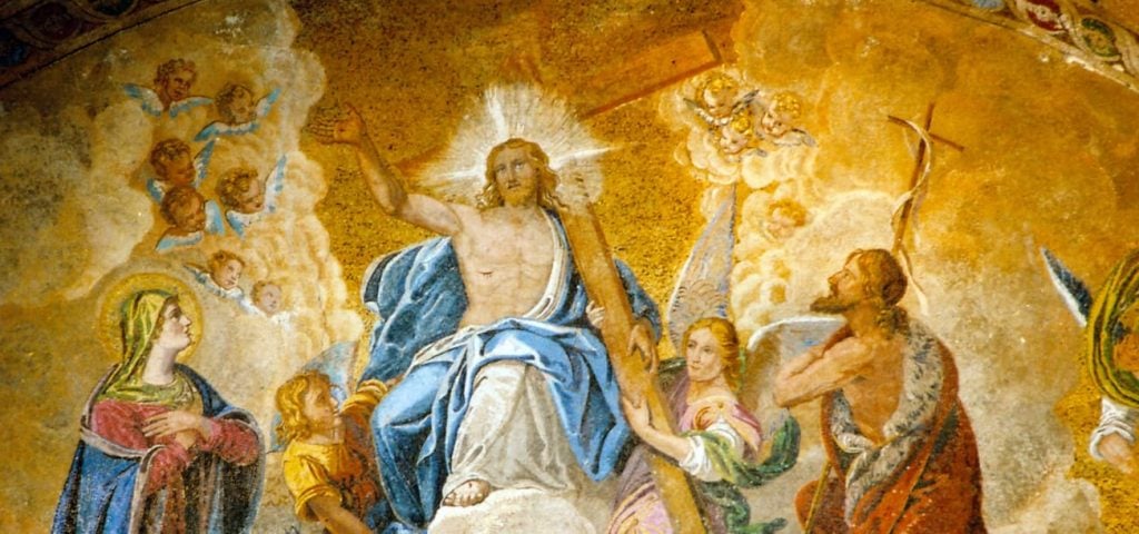 christ jesus in the clouds with the cross