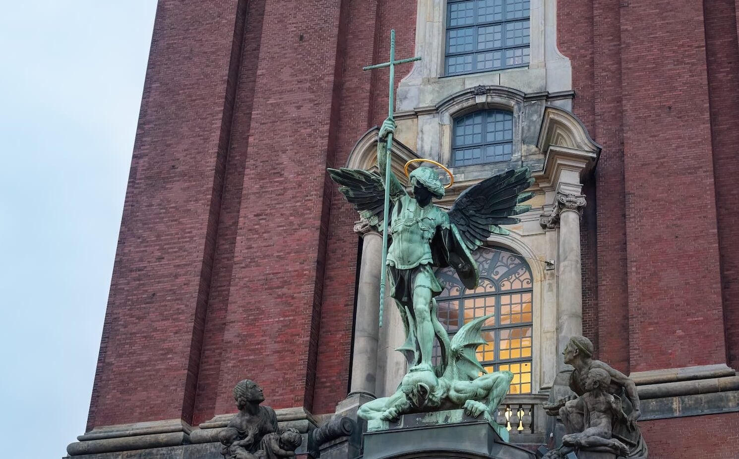 st michael victory over the devil sculpture
