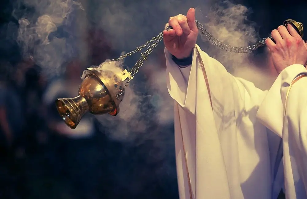 Incense during Eucharistic Adoration and the recitation of the Divine Praises in a Catholic Church.