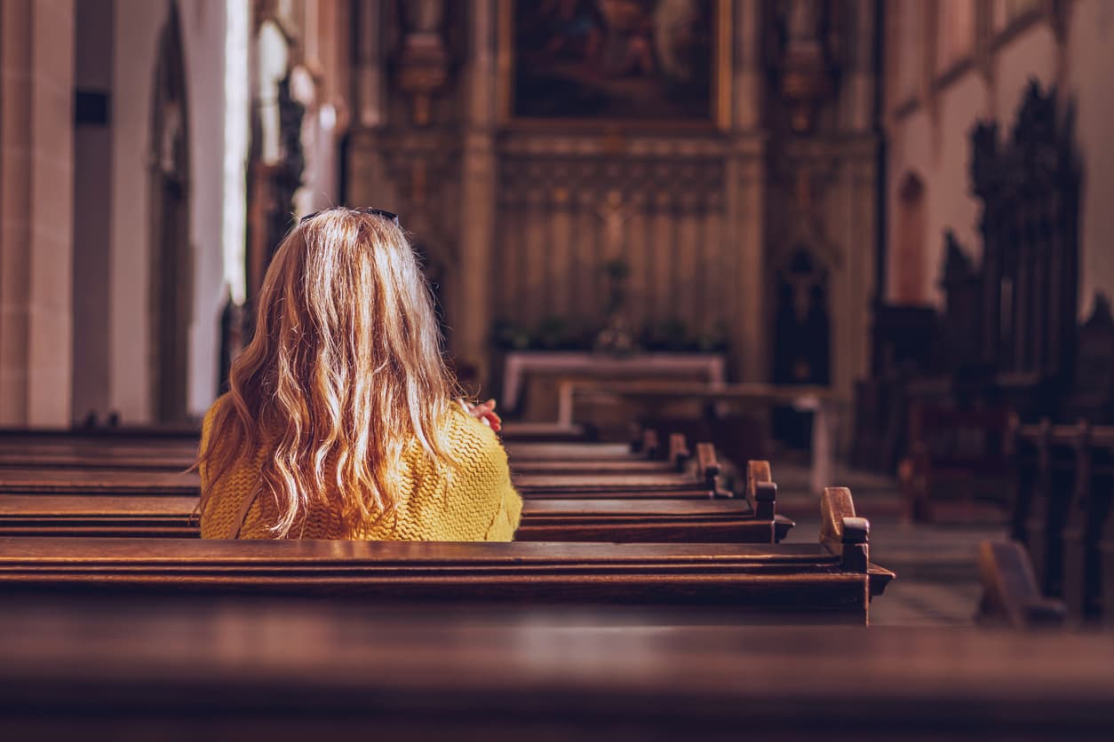 Woman in church praying